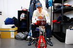 SUZUKA, JAPAN - OCTOBER 04:  Sebastian Vettel of Germany and Red Bull Racing celebrates with the winners trophy in his changing room after victory the Japanese Formula One Grand Prix at Suzuka Circuit on October 4, 2009 in Suzuka, Japan.  (Photo by Mark Thompson/Getty Images)