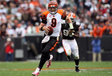 CLEVELAND - OCTOBER 04:  Carson Palmer #9 of the Cincinnati Bengals runs for a first down late in the overtime period against the Cleveland Browns during their game at Cleveland Browns Stadium on October 4, 2009 in Cleveland, Ohio. The Bengals defeated the Browns 23-20 in overtime.  (Photo by Jim McIsaac/Getty Images)