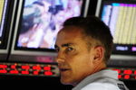 SINGAPORE - SEPTEMBER 26:  McLaren Mercedes Team Principal Martin Whitmarsh is seen on the pitwall during qualifying for the Singapore Formula One Grand Prix at the Marina Bay Street Circuit on September 26, 2009 in Singapore.  (Photo by Clive Mason/Getty Images)