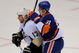 UNIONDALE, NY - OCTOBER 03: Michael Rupp #17 of the Pittsburgh Penguins slows down John Tavares #91 of the New York Islanders in the first period of their NHL game on October 3, 2009 in Uniondale, New York. (Photo by Paul Bereswill/Getty Images)