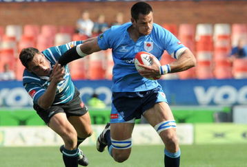 PRETORIA, SOUTH AFRICA - OCTOBER 03:   Pierre Spies gets past Jaco Bekker during the Absa Currie Cup match between Blue Bulls and GWK Griquas from Loftus Versfeld Stadium on October 03, 2009 in Pretoria, South Africa. (Photo by Lee Warren/Gallo Images/Getty Images)