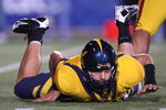 BERKELEY, CA - OCTOBER 03:  Kevin Riley #13 of the California Golden Bears lies on the ground against the USC Trojans at Memorial Stadium on October 3, 2009 in Berkeley, California.  (Photo by Jed Jacobsohn/Getty Images)