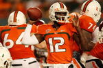 FORT LAUDERDALE, FL - OCTOBER 03: Quarterback Jacory Harris #12 of the Miami Hurricanes throws a pass against the Oklahoma Sooners at Land Shark Stadium on October 3, 2009 in Fort Lauderdale, Florida. Miami defeated Oklahoma 21-20. (Photo by Doug Benc/Getty Images)