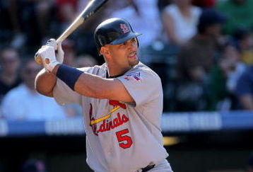 DENVER - SEPTEMBER 27:  Albert Pujols #5 of the St. Louis Cardinals takes an at bat against the Colorado Rockies at Coors Field on September 27, 2009 in Denver, Colorado. The Rockies defeated the Cardinals 4-3.  (Photo by Doug Pensinger/Getty Images)