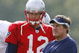 FOXBORO, MA - JULY 27: Quarterback Tom Brady #12 and coach Bill Belichick of the New England Patriots confer during training camp practice on July 27, 2007 at Gillette Stadium in Foxboro, Massachusetts. (Photo by Jim Rogash/Getty Images)