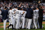 NEW YORK - SEPTEMBER 27:  The New York Yankees celebrate after defeating the Boston Red Sox on September 27, 2009 at Yankee Stadium in the Bronx borough of New York City. The Yankees won the game 4-2 to earn their 100th win of the season as well as clinching the American League Eastern Division.  (Photo by Jim McIsaac/Getty Images)