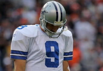 DENVER - OCTOBER 04:  Quarterback Tony Romo #9 of the Dallas Cowboys walks to the bench after failing to convert a third down against the Denver Broncos during NFL action at Invesco Field at Mile High on October 4, 2009 in Denver, Colorado. The Broncos defeated the Cowboys 17-10.  (Photo by Doug Pensinger/Getty Images)