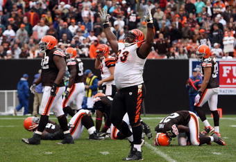 CLEVELAND - OCTOBER 04:  Bobbie Williams #63 of the Cincinnati Bengals celebrates after his team defeated the Cleveland Browns at Cleveland Browns Stadium on October 4, 2009 in Cleveland, Ohio. The Bengals defeated the Browns 23-20 in overtime.  (Photo by Jim McIsaac/Getty Images)