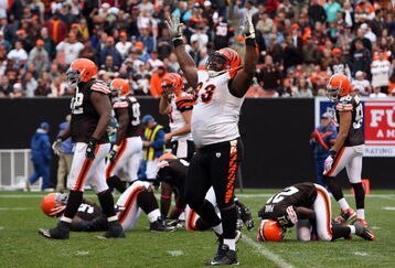 CLEVELAND - OCTOBER 04:  Bobbie Williams #63 of the Cincinnati Bengals celebrates after his team defeated the Cleveland Browns at Cleveland Browns Stadium on October 4, 2009 in Cleveland, Ohio. The Bengals defeated the Browns 23-20 in overtime.  (Photo by Jim McIsaac/Getty Images)