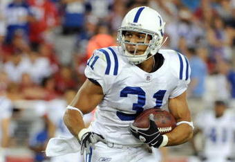 GLENDALE, AZ - SEPTEMBER 27:  Donald Brown #31 of the Indianapolis Colts runs against the Arizona Cardinals during the game at University of Phoenix Stadium on September 27, 2009 in Glendale, Arizona.  (Photo by Harry How/Getty Images)
