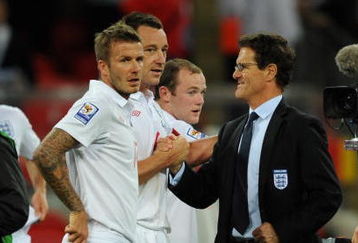 LONDON - SEPTEMBER 09:   England Manager Fabio Capello congratulates David Beckham and John Terry of England at the end of the FIFA 2010 World Cup Group 6 Qualifying match between England and Croatia at Wembley Stadium on September 9, 2009 in London, England. (Photo by Shaun Botterill/Getty Images)