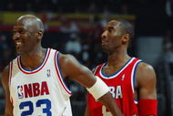 ATLANTA, GA - FEBRUARY 9:  Michael Jordan (Washington Wizards) #23 of the Eastern Conference All-Stars jokes with Kobe Bryant (Los Angeles Lakers) #8 of the Western Conference All-Stars during the 2003 NBA All-Star Game on February 9, 2003 at Philips Arena in Atlanta, Georgia.  NOTE TO USER:  User expressly acknowledges and agrees that, by downloading and or using this photograph, user is consenting to the terms and conditions of the Getty Images license agreement. (Photo by Jamie Squire/Getty Images)