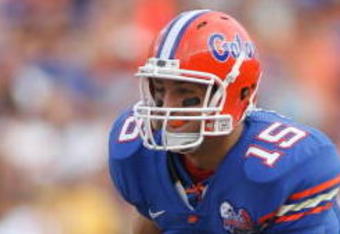 GAINESVILLE, FL - OCTOBER 7:  Quarterback Tim Tebow #15 of the Florida Gators runs with the ball during the game against the LSU Tigers at Ben Hill Griffin Stadium on October 7, 2006 in Gainesville, Florida. Florida won 23-10.  (Photo by Marc Serota/Getty Images)