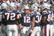 FOXBORO, MA - OCTOBER 4:  Tom Brady #12 of the New England Patriots stands in a huddle during a game against the Baltimore Ravens at Gillette Stadium on October 4, 2009 in Foxboro, Massachusetts. (Photo by Jim Rogash/Getty Images)