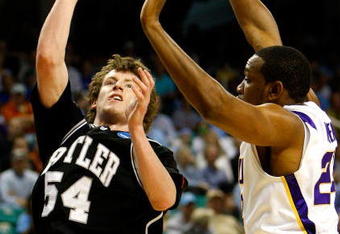 GREENSBORO, NC - MARCH 19:  Matt Howard #54 of the Butler Bulldogs shoots against Storm Warren #24 of the Louisiana State University Tigers during the first round of the NCAA Division I Men's Basketball Tournament at the Greensboro Coliseum on March 19, 2009 in Greensboro, North Carolina.  (Photo by Streeter Lecka/Getty Images)