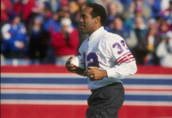 21 Nov 1993:  O.J. Simpson runs onto the field in a half-time ceremony during a game between the Indianapolis Colts and the Buffalo Bills at Rich Stadium in Orchard Park, New York.  The Bills won the game, 23-9. Mandatory Credit: Jed Jacobsohn  /Allsport