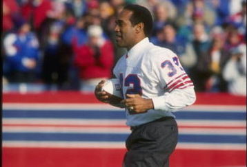 21 Nov 1993:  O.J. Simpson runs onto the field in a half-time ceremony during a game between the Indianapolis Colts and the Buffalo Bills at Rich Stadium in Orchard Park, New York.  The Bills won the game, 23-9. Mandatory Credit: Jed Jacobsohn  /Allsport