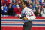 21 Nov 1993:  O.J. Simpson runs onto the field in a half-time ceremony during a game between the Indianapolis Colts and the Buffalo Bills at Rich Stadium in Orchard Park, New York.  The Bills won the game, 23-9. Mandatory Credit: Jed Jacobsohn  /Allsport