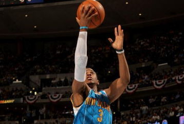 DENVER - APRIL 29:  Chris Paul #3 of the New Orleans Hornets takes a shot against the Denver Nuggets in Game Five of the Western Conference Quarterfinals during the 2009 NBA Playoffs at Pepsi Center on April 29, 2009 in Denver, Colorado. The Nuggets defeated the Hornets 107-86 to advance to the Western Conference Semifinals against Dallas.  NOTE TO USER: User expressly acknowledges and agrees that, by downloading and or using this photograph, User is consenting to the terms and conditions of the Getty Images License Agreement.  (Photo by Doug Pensinger/Getty Images)