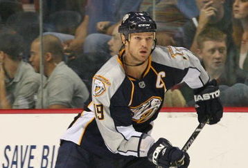 NASHVILLE, TN - SEPTEMBER 26:  Foward Jason Arnott #19 of the Nashville Predators skates during a pre-season NHL Hockey game at the Sommet Center on September 26, 2009 in Nashville, Tennessee.  (Photo by Frederick Breedon/Getty Images)