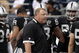 HOUSTON - OCTOBER 04: Head coach Tom Cable of the Oakland Raiders walks the sidelines at Reliant Stadium on October 4, 2009 in Houston, Texas.  (Photo by Bob Levey/Getty Images)
