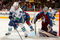 DENVER - OCTOBER 03:  Daniel Sedin #22 of the Vancouver Canucks controls the puck as goaltender Craig Anderson #41of the Colorado Avalanche defends the goal during NHL action at the Pepsi Center on October 3, 2009 in Denver, Colorado. The Avalanche defeated the Canucks 3-0.  (Photo by Doug Pensinger/Getty Images)