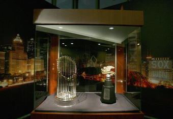 CHICAGO - APRIL 02:  The World Series and American League Championship trophies are on display for the Opening Day game between the Chicago White Sox and the Cleveland Indians on April 2, 2006 at U.S. Cellular Field in Chicago, Illinois.  (Photo by Jonathan Daniel/Getty Images)