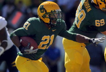 EUGENE, OR - SEPTEMBER 26: Running back LaMichael James #21 of the Oregon Ducks looks for some running room in the first quarter of the game against the California Bears at Autzen Stadium on September 26, 2009 in Eugene, Oregon. Oregon won the game 42-3. (Photo by Steve Dykes/Getty Images)