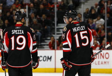 OTTAWA - MARCH 11:  Jason Spezza #19 and Dany Heatley #15 of the Ottawa Senators stand on the ice during the game against the Tampa Bay Lightning on March 11, 2009 at the Scotiabank Place in Ottawa, Ontario, Canada. (Photo by Phillip MacCallum/Getty Images)