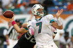 MIAMI - OCTOBER 04:  Defensive end Ryan Denney #92 of the Buffalo Bills causes quarterback Chad Henne #7 of the Miami Dolphins to fumble the ball in the fourth quarter at Land Shark Stadium on October 4, 2009 in Miami, Florida. The Dolphins defeated the Bills 38-10.  (Photo by Doug Benc/Getty Images)