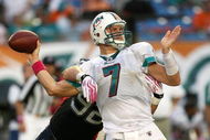 MIAMI - OCTOBER 04:  Defensive end Ryan Denney #92 of the Buffalo Bills causes quarterback Chad Henne #7 of the Miami Dolphins to fumble the ball in the fourth quarter at Land Shark Stadium on October 4, 2009 in Miami, Florida. The Dolphins defeated the Bills 38-10.  (Photo by Doug Benc/Getty Images)