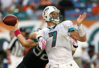 MIAMI - OCTOBER 04:  Defensive end Ryan Denney #92 of the Buffalo Bills causes quarterback Chad Henne #7 of the Miami Dolphins to fumble the ball in the fourth quarter at Land Shark Stadium on October 4, 2009 in Miami, Florida. The Dolphins defeated the Bills 38-10.  (Photo by Doug Benc/Getty Images)