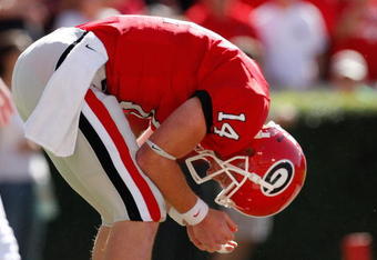 ATHENS, GA - OCTOBER 03: Quarterback Joe Cox #14 of the Georgia Bulldogs reacts after nearly throwing an interception to the Louisiana State University Tigers at Sanford Stadium on October 3, 2009 in Athens, Georgia. (Photo by Kevin C. Cox/Getty Images)