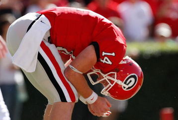 ATHENS, GA - OCTOBER 03: Quarterback Joe Cox #14 of the Georgia Bulldogs reacts after nearly throwing an interception to the Louisiana State University Tigers at Sanford Stadium on October 3, 2009 in Athens, Georgia. (Photo by Kevin C. Cox/Getty Images)