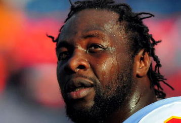 DENVER - DECEMBER 9:  Tamba Hali #91 of the Kansas City Chiefs looks on during warm-ups before the football game against the Denver Broncos at Invesco Field at Mile High on December 9, 2007 in Denver, Colorado.  (Photo by Steve Dykes/Getty Images)