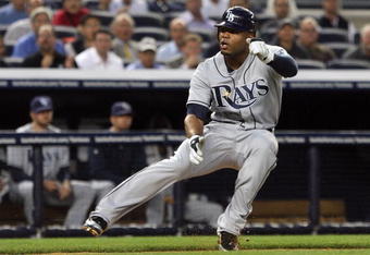 NEW YORK - SEPTEMBER 08:  Carl Crawford #13 of the Tampa Bay Rays is caught in a first inning rundown against the New York Yankees on September 8, 2009 at Yankee Stadium in the Bronx borough of New York City.  (Photo by Jim McIsaac/Getty Images)