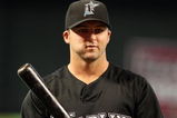 PHOENIX - JULY 10:  Dan Uggla #6 of the Florida Marlins warms up before the major league baseball game against the Arizona Diamondbacks at Chase Field on July 10, 2009 in Phoenix, Arizona. The Diamondbacks defeated the Marlins 8-0. (Photo by Christian Petersen/Getty Images)