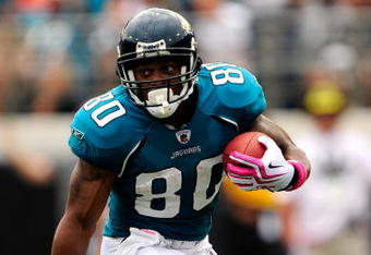 JACKSONVILLE, FL - OCTOBER 04:  Mike Thomas #80 of the Jacksonville Jaguars runs during the game against the Tennessee Titans at Jacksonville Municipal Stadium on October 4, 2009 in Jacksonville, Florida.  (Photo by Sam Greenwood/Getty Images)