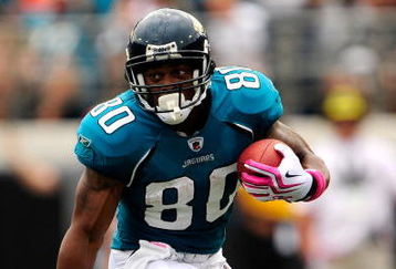 JACKSONVILLE, FL - OCTOBER 04:  Mike Thomas #80 of the Jacksonville Jaguars runs during the game against the Tennessee Titans at Jacksonville Municipal Stadium on October 4, 2009 in Jacksonville, Florida.  (Photo by Sam Greenwood/Getty Images)