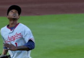 DENVER - JULY 06:  Center fielder Nyjer Morgan #1 of the Washington Nationals tracks down a fly ball against the Colorado Rockies during MLB action at Coors Field on July 6, 2009 in Denver, Colorado. The Rockies defeated the Nationals 1-0.  (Photo by Doug Pensinger/Getty Images)