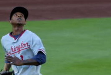 DENVER - JULY 06:  Center fielder Nyjer Morgan #1 of the Washington Nationals tracks down a fly ball against the Colorado Rockies during MLB action at Coors Field on July 6, 2009 in Denver, Colorado. The Rockies defeated the Nationals 1-0.  (Photo by Doug Pensinger/Getty Images)