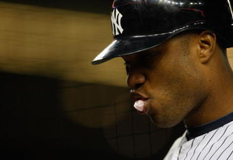 NEW YORK - SEPTEMBER 30: Robinson Cano #24 of the New York Yankees walks back to the dugout during the game against the Kansas City Royals on September 30, 2009 at Yankee Stadium in the Bronx borough of New York City. (Photo by Jared Wickerham/Getty Images)