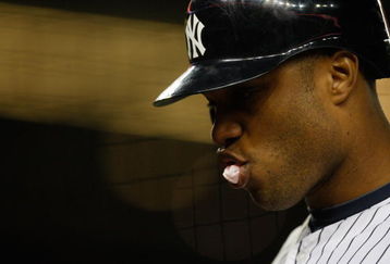 NEW YORK - SEPTEMBER 30: Robinson Cano #24 of the New York Yankees walks back to the dugout during the game against the Kansas City Royals on September 30, 2009 at Yankee Stadium in the Bronx borough of New York City. (Photo by Jared Wickerham/Getty Images)