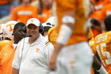 KNOXVILLE, TN - OCTOBER 23:  Head coach Phil Fulmer of the Tennessee Volunteers glances at quarterback Erik Ainge #10 during the game against the Alabama Crimson Tide at Neyland Stadium on October 23, 2004 in Knoxville, Tennessee. (Photo by Jamie Squire/Getty Images)