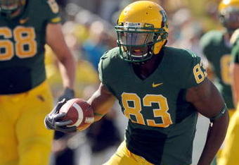 EUGENE, OR - SEPTEMBER 26: Ed Dickson #83 of the Oregon Ducks  heads up the field with a reception in the third quarter of the game against the California Bears at Autzen Stadium on September 26, 2009 in Eugene, Oregon. The Ducks won the game 42-3.  (Photo by Steve Dykes/Getty Images)
