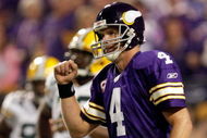 MINNEAPOLIS - OCTOBER 05:  Quarterback Brett Favre #4 of the Minnesota Vikings pumps his fist after a penalty against the Green Bay Packers during the game on October 5, 2009 at Hubert H. Humphrey Metrodome in Minneapolis, Minnesota.  (Photo by Jamie Squire/Getty Images)