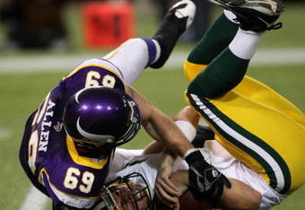 MINNEAPOLIS - NOVEMBER 09:  Defensive end Jared Allen #69 of the Minnesota Vikings sacks quarterback Aaron Rodgers #12 of the Green Bay Packers on November 9, 2008 at the Metrodome in Mineapolis, Minnesota.  (Photo by Stephen Dunn/Getty Images)