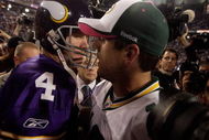 MINNEAPOLIS - OCTOBER 05:  Quarterback Brett Favre #4 of the Minnesota Vikings hugs Aaron Rodgers #12 of the Green Bay Packers following the Vikings victory over the Packers on October 5, 2009 at Hubert H. Humphrey Metrodome in Minneapolis, Minnesota.  (Photo by Jamie Squire/Getty Images)