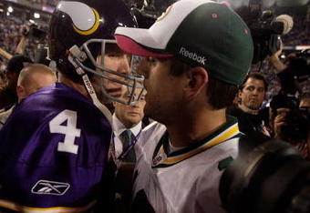 MINNEAPOLIS - OCTOBER 05:  Quarterback Brett Favre #4 of the Minnesota Vikings hugs Aaron Rodgers #12 of the Green Bay Packers following the Vikings victory over the Packers on October 5, 2009 at Hubert H. Humphrey Metrodome in Minneapolis, Minnesota.  (Photo by Jamie Squire/Getty Images)