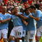 MANCHESTER, ENGLAND - SEPTEMBER 20: Craig Bellamy of Manchester City celebrates scoring his team's third goal with his team mates during the Barclays Premier League match between Manchester United and Manchester City at Old Trafford on September 20, 2009 in Manchester, England. (Photo by Alex Livesey/Getty Images)